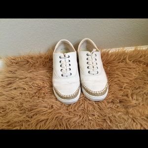 UGG white tennis shoe.